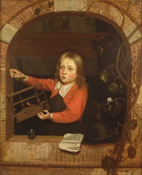 Niño con una jaula de pájaros